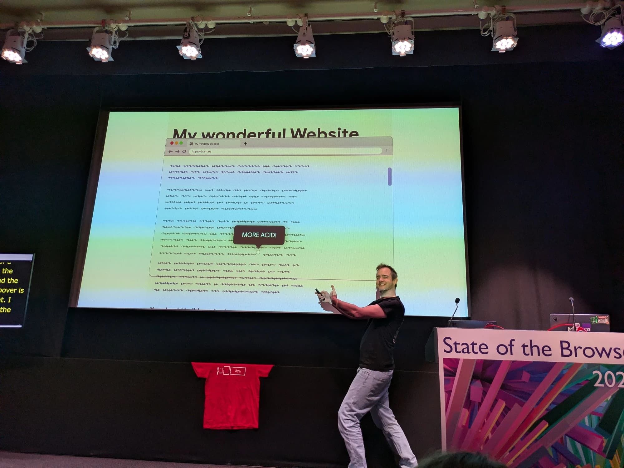 Bramus stood on stage highlight a popover which reads More Acid